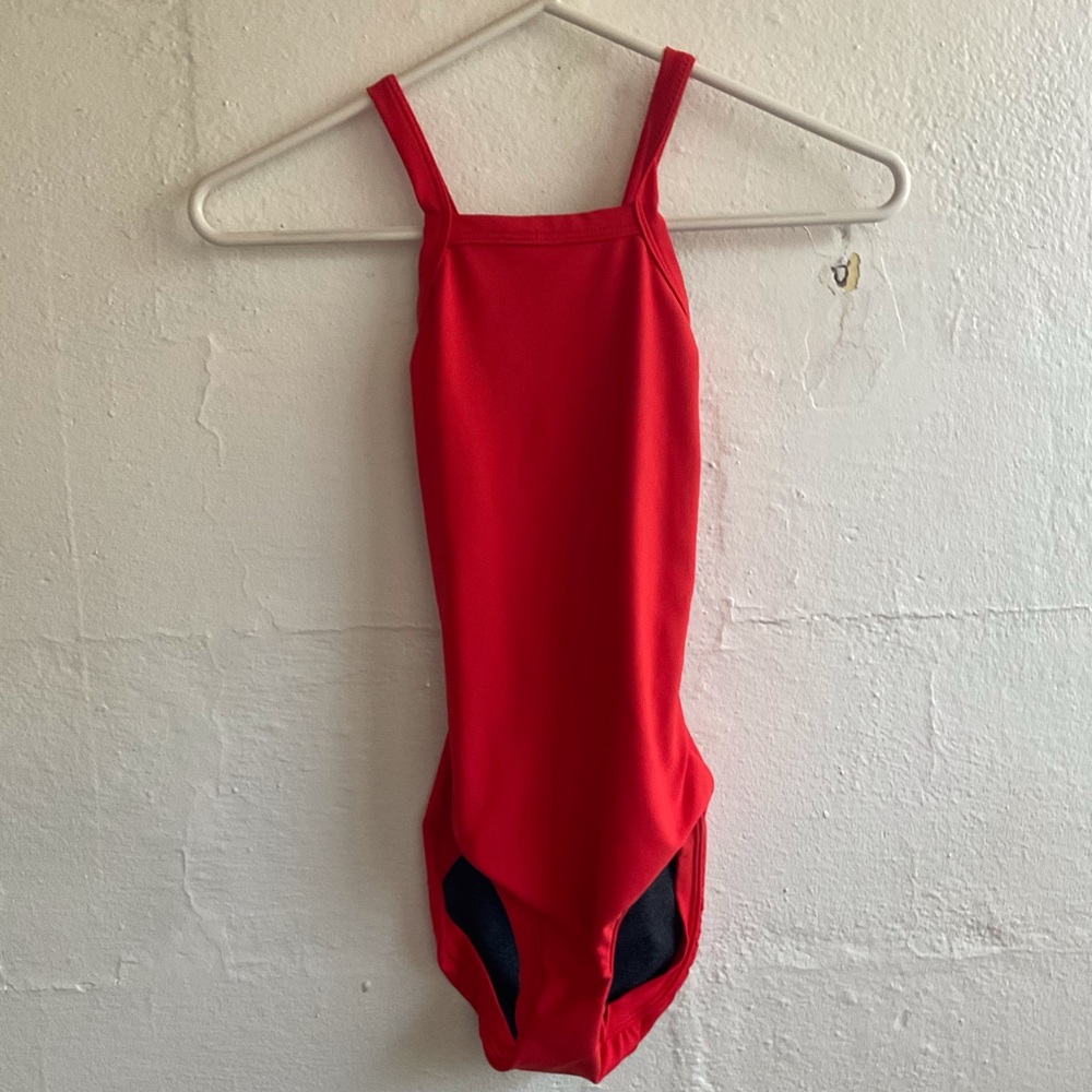 red leotard with crossed back
